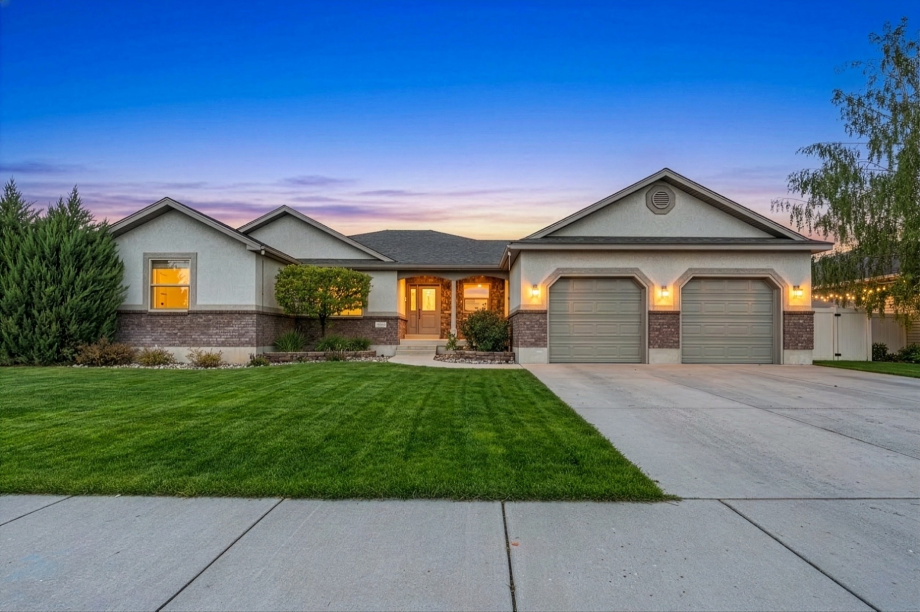 626 Cook Street — established Rexburg home with brick, stucco, and stone facade