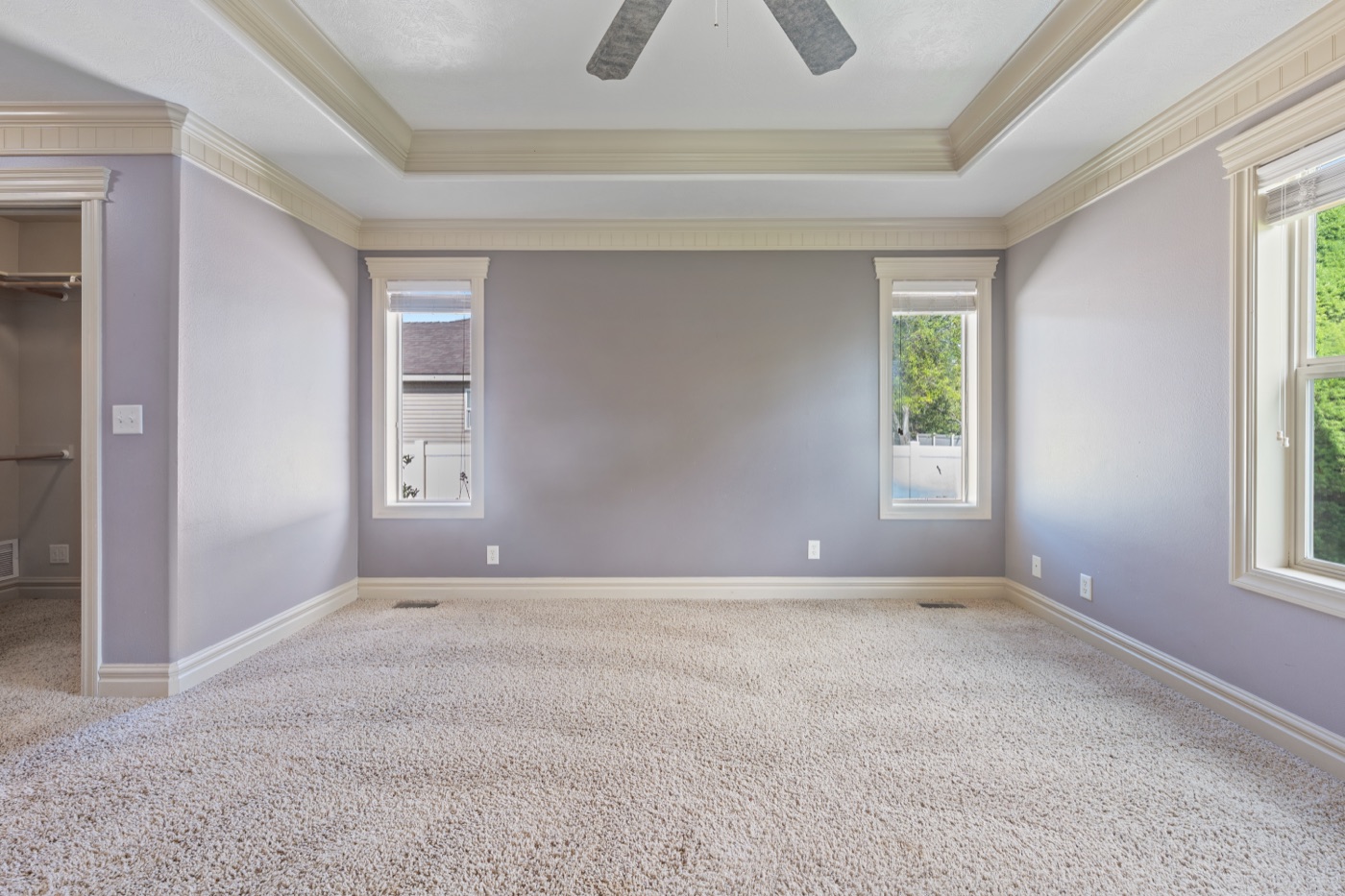Primary bedroom wide angle with closet entry
